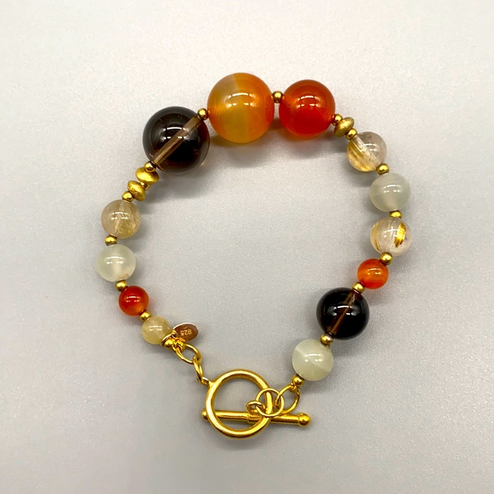This is a beautiful multi-stone sterling silver W/ gold vermeil overlay size 7